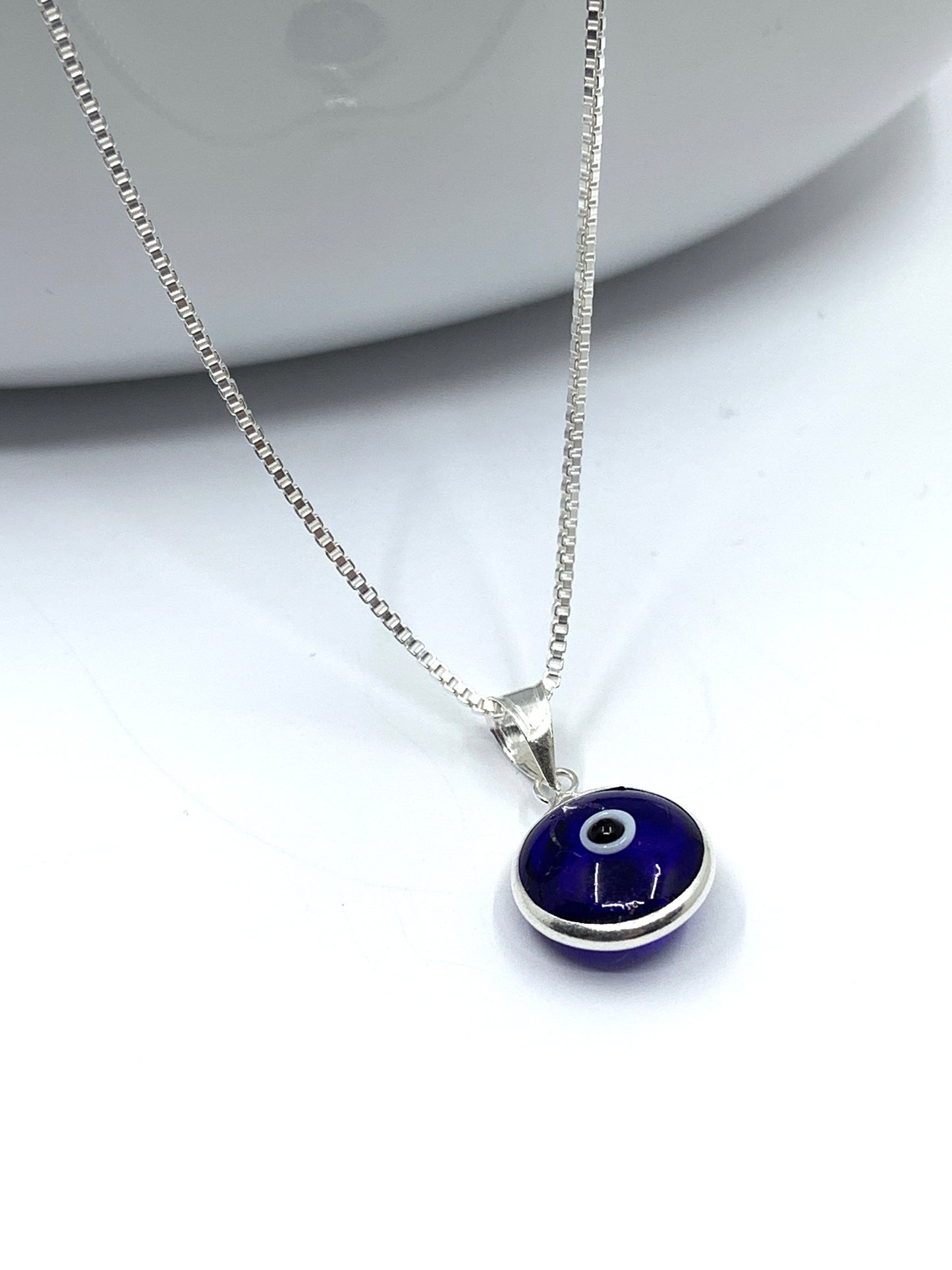 Royal blue evil eye pendant necklace