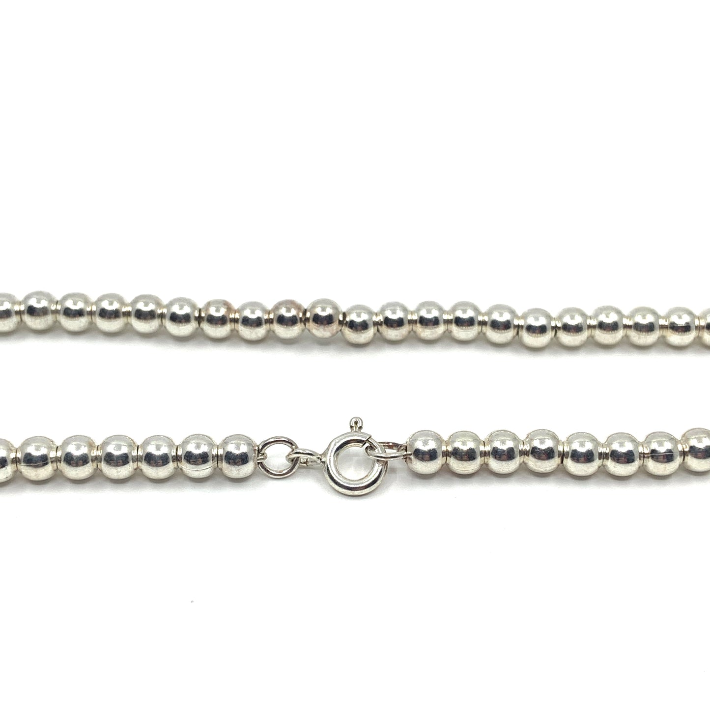 Sterling Silver Ball Bead Necklace, made with 4mm beads with a spring ring closure.